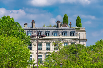 Paris, beautiful Haussmann facades and roofs in a luxury area of the capital