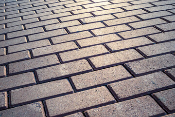 Gray brick design on the road for pedestrians. sidewalks, roads, pavers, vintage and modern...
