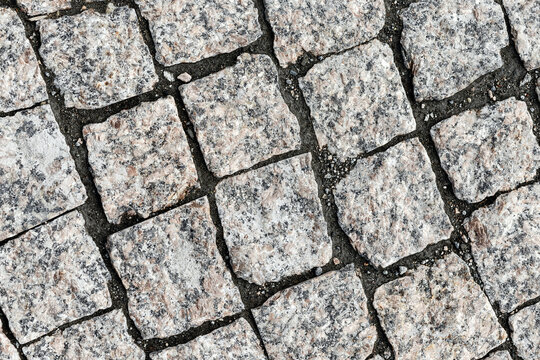 Overhead View Of Cobblestone Street Texture. Stone Pavement Texture