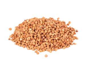 Roasted buckwheat grains, isolated on white background. Dry brown buckwheat groats.