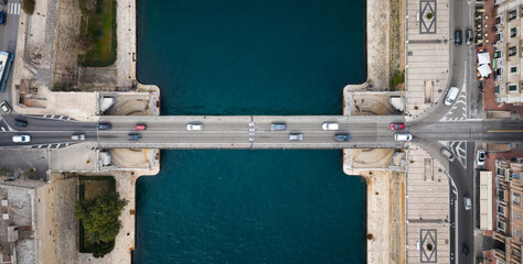 Top view of bridge with cars. Taranto city, Italy
