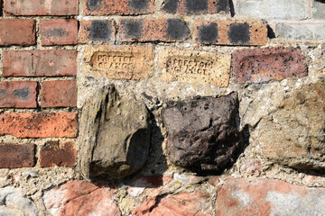 Close Up of Coloured Stone Stones & Bricks in Old Rough Textured Masonry Wall