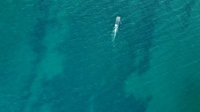 Aerial view of a boat sailing on Lake Ohrid. North Macedonia. High quality 4k footage