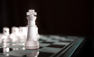Chess board game competition, success and leadership business concept with a king in the focus