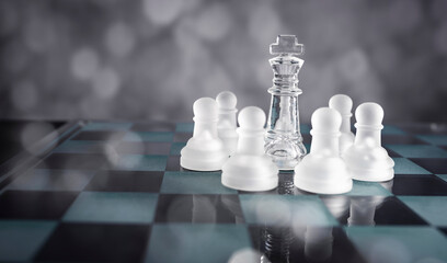 Chess board game competition, success and leadership business concept with a king standing in the...