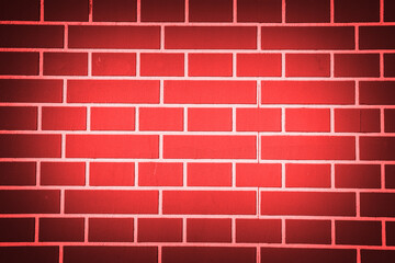Red background or texure for neon lights. Nightly brick wall. 