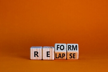 Relapse or reform symbol. Turned wooden cubes and changed the word 'relapse' to 'reform'. Beautiful...