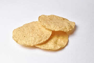 Tostadas on white background, mexican traditional food for tortillas and tacos that can be eaten with avocado, barbacoa or cheese