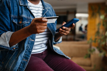 African american girl shopping online.