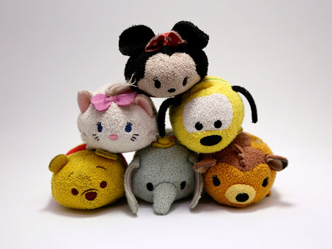 Toys Tsum tsum. Minnie Mouse, kitty Mary, Pluto, Winnie the Pooh, Dumbo and Bambi. Walt Disney Studios characters. Stuffed toys for children. Stackable toys with famous cartoons.