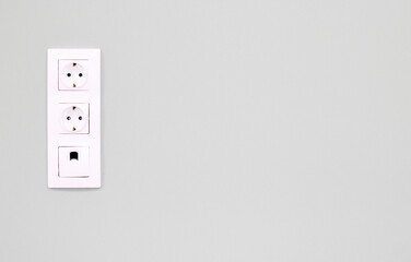 White double socket on white background.Electric plug. European high voltage 220W sockets.