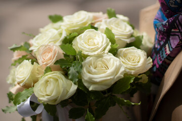 Fototapeta na wymiar Bouquet of white roses. The bride's bouquet.