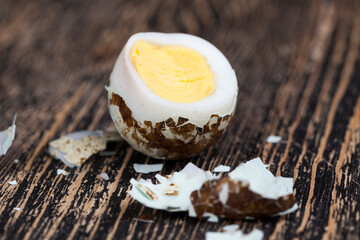 boiled quail egg on a wooden table