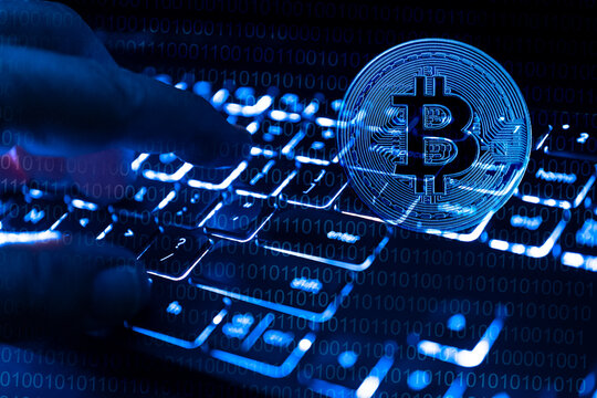 Fingers at computer keyboard and bitcoin, cgi