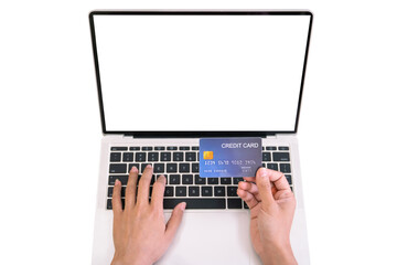 Isolated with clipping path. Cheerful young woman using a credit card for online shopping.