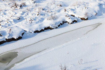 river covered with ice and snow