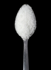 white sugar on the spoon