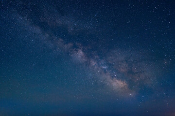 Naklejka na ściany i meble Milky Way Galaxy Stars in Wyoming Summer Night Time Sky with Nebulas and Falling Star Dust