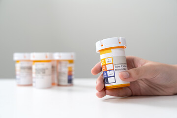 Orange pill bottle concept for healthcare and medicine