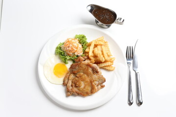 grilled golden bbq meat chicken cop pork cutlet beef steak with fried egg, French fries, coleslaw...