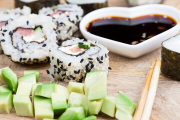 made from rice and trout or salmon with vegetables sushi food