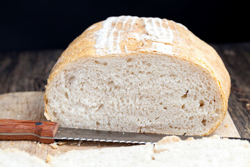 fresh loaf of wheat flour bread