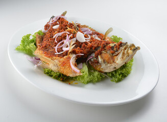 deep fried crispy whole grouper fish with spicy chilli onion sambal sauce asian Halal seafood menu