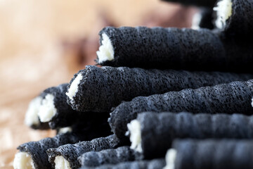 black sweet waffles made from wheat flour