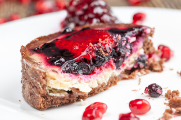tartlet with berry filling is broken and crumbled