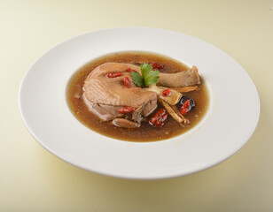 chef double boiled herbal chicken leg soup with steam white rice asian healthy halal menu