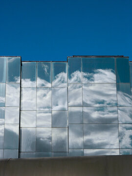 Reflection of clouds in building