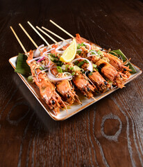 Thai style grilled bbq big tiger prawn with spicy chilli onion sauce and lime seafood halal menu