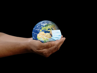 Earth or Globe map hold on the human hand. Save earth concept. World Earth Day or Environment Day. Face mask isolated with globe map.
