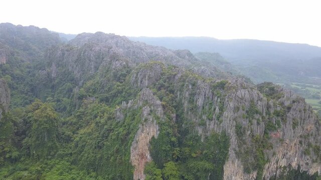 Aerial view of Limestone mountain and rice field in Noen Maprang district, Phitsanulok, Thailand.