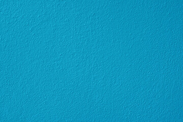 Blue stucco wall texture, Paper wide background with empty space, copy space. Blue cement texture background. 