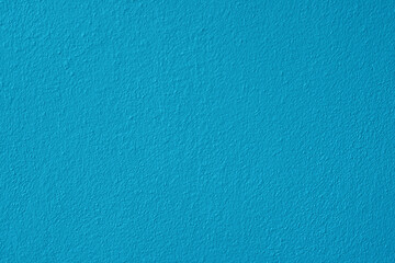 Blue stucco wall texture, Paper wide background with empty space, copy space. Blue cement texture background. 