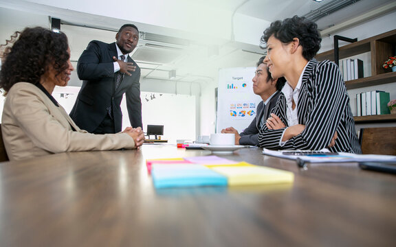 Black Businessman express his pround of succesfull to acheive business goal in the past 10 years