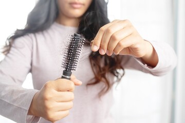 Women are allergic to shampoo causing hair loss and dandruff.