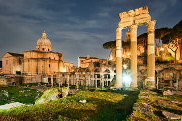 forum romanum in Rome, Italy. Temple of Saturn and Temple of Castor and Pollux, ancient ruins of...