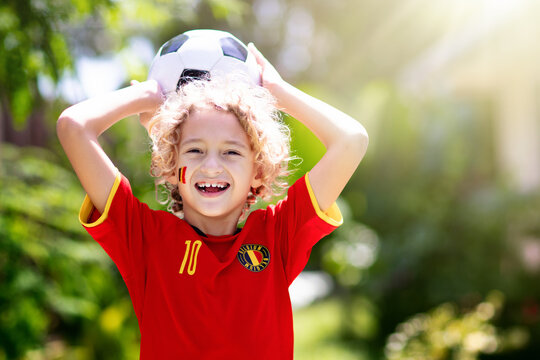 Belgium football fan. Belgian kids play soccer.