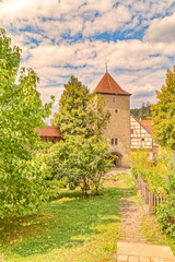 Fototapeta na wymiar Bebenhausen, Germany – tower with an entrance gate to the monastery area.