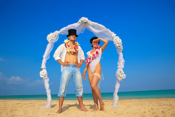 Newlywed couple in Hawaiian Hula