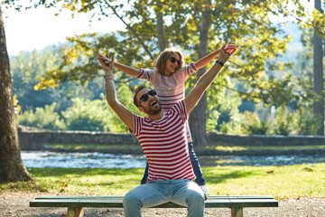 Obraz premium Single father and little daughter enjoying in the park.