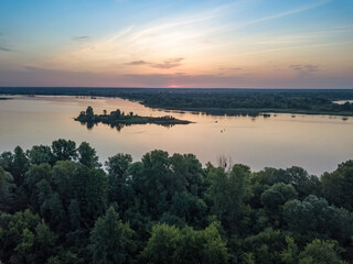Fototapeta na wymiar Sunrise over the wide river Dnieper. Aerial drone view.