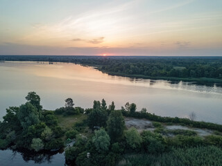 Sunrise over the wide river Dnieper. Aerial drone view.