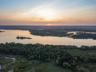 Sunrise over the wide river Dnieper. Aerial drone view.
