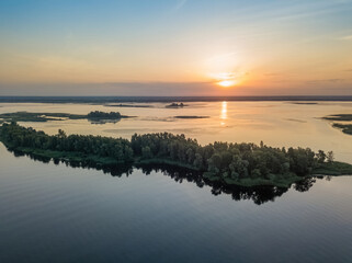 Sunrise over the wide river Dnieper. Aerial drone view.