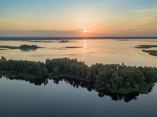 Sunrise over the wide river Dnieper. Aerial drone view.