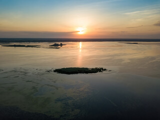 Sunrise over the wide river Dnieper. Aerial drone view.