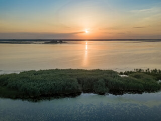 Sunrise over the wide river Dnieper. Aerial drone view.